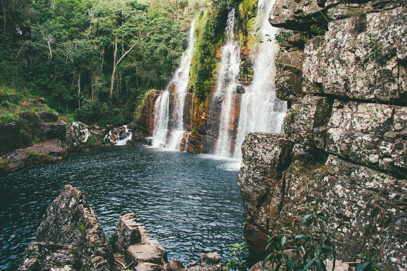 water falls on rocky mountain - Cachoeiras na Chapada dos Veadeiros