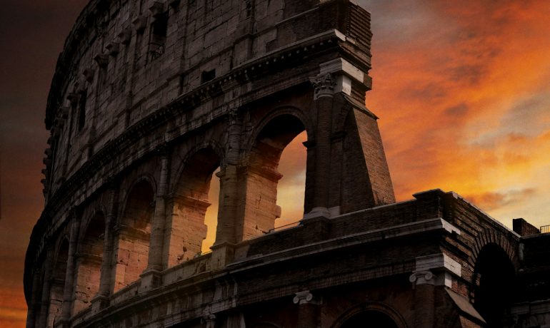 photo of Colosseum during golden hour - Roteiro Cultural Roma