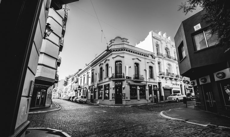 greyscale photography of buildings - Feira de San Telmo