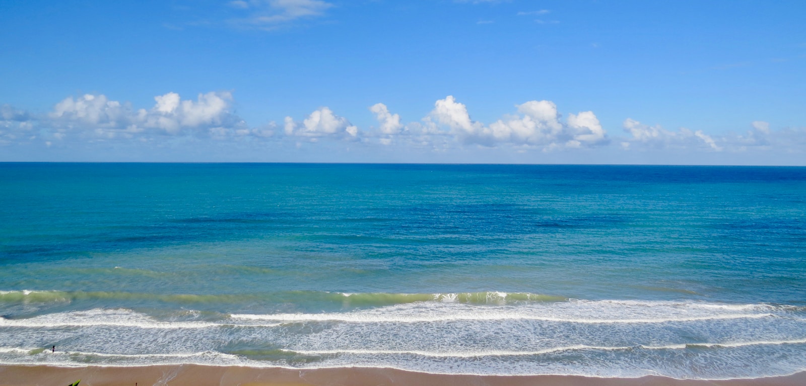 blue sea under blue sky and white clouds during daytime - Praias do Nordeste