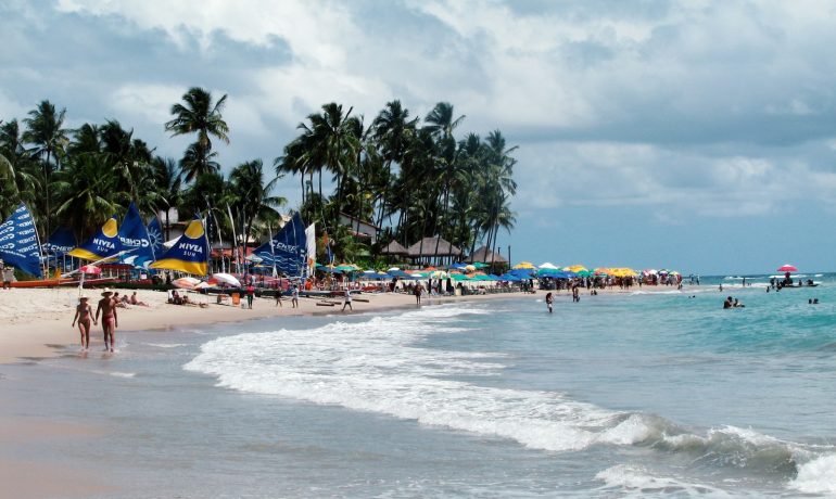 people on beach during daytime - Os melhores resorts de Porto de Galinhas